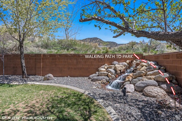 1328 N Parkside Dr, Cedar City, UT 84721 - view of yard with fence and a mountain view