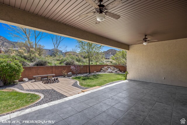 1328 N Parkside Dr, Cedar City, UT 84721 - view of patio / terrace with a fenced backyard and a ceiling fan