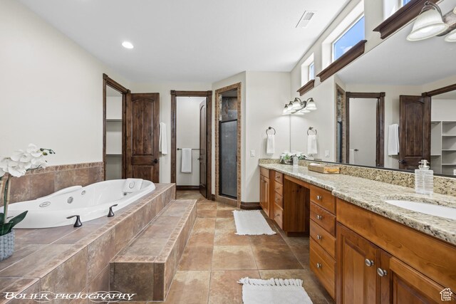 1328 N Parkside Dr, Cedar City, UT 84721 - bathroom featuring visible vents, a tub with jets, a shower stall, and vanity