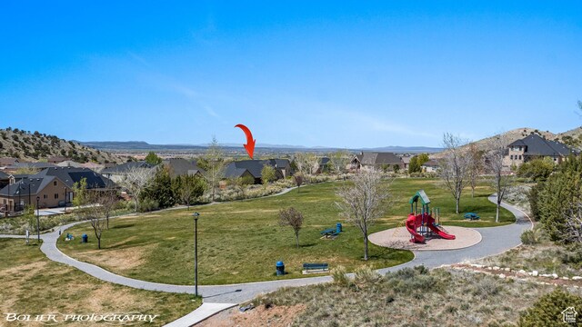 1328 N Parkside Dr, Cedar City, UT 84721 - view of property's community featuring a lawn, a residential view, and playground community