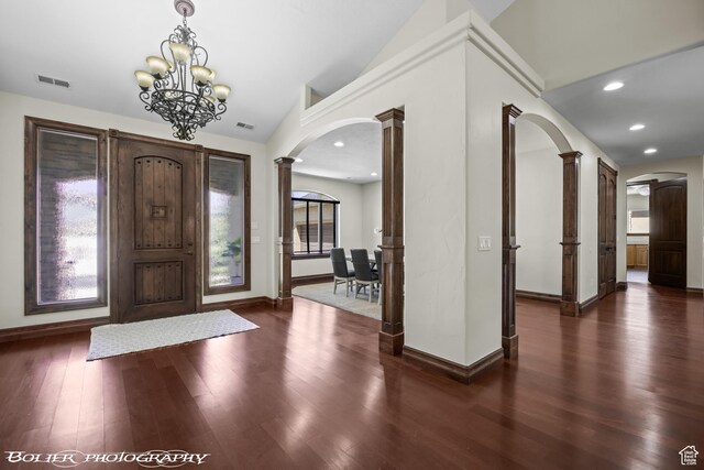 1328 N Parkside Dr, Cedar City, UT 84721 - foyer featuring arched walkways, a notable chandelier, decorative columns, and visible vents