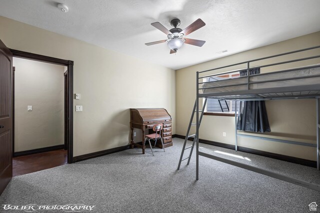 1328 N Parkside Dr, Cedar City, UT 84721 - carpeted bedroom with a textured ceiling, baseboards, visible vents, and ceiling fan