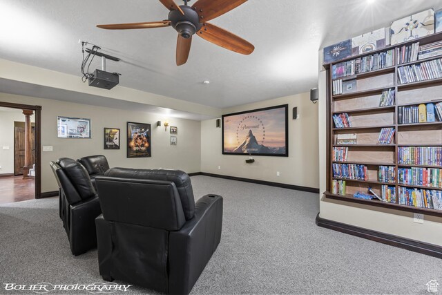 1328 N Parkside Dr, Cedar City, UT 84721 - carpeted home theater room featuring baseboards and ceiling fan