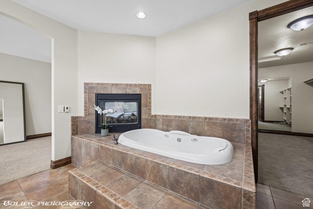 1328 N Parkside Dr, Cedar City, UT 84721 - bathroom featuring baseboards and a garden tub
