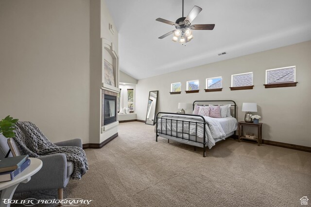 1328 N Parkside Dr, Cedar City, UT 84721 - bedroom with visible vents, baseboards, light colored carpet, a tiled fireplace, and vaulted ceiling