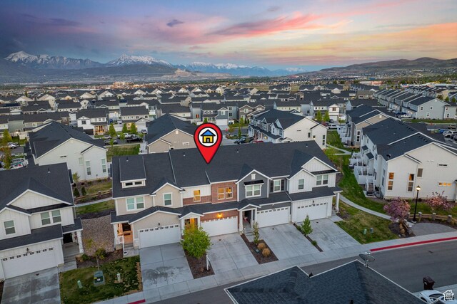 13077 S Keegan Dr, Herriman, UT 84096 - aerial view at dusk featuring a residential view and a mountain view