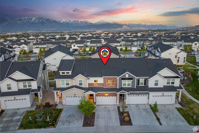 13077 S Keegan Dr, Herriman, UT 84096 - aerial view at dusk featuring a residential view and a mountain view