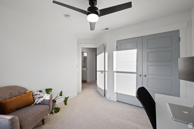 13077 S Keegan Dr, Herriman, UT 84096 - home office featuring baseboards, ceiling fan, light carpet, and visible vents