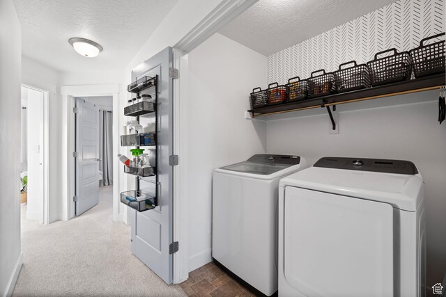13077 S Keegan Dr, Herriman, UT 84096 - laundry area featuring baseboards, laundry area, a textured ceiling, and washer and clothes dryer