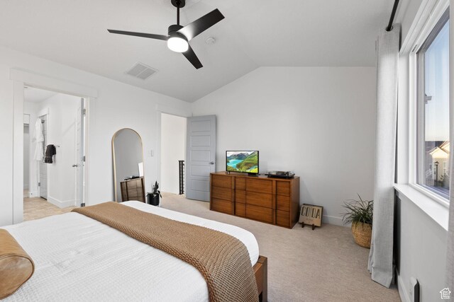 13077 S Keegan Dr, Herriman, UT 84096 - bedroom featuring ceiling fan, visible vents, light colored carpet, arched walkways, and lofted ceiling