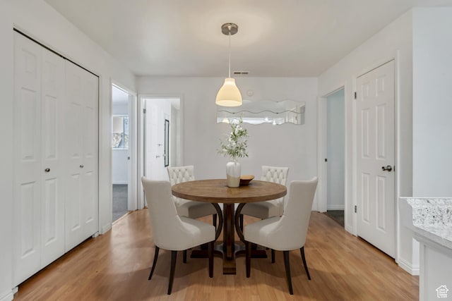 223 E Hill Ave Unit 6, Millcreek, UT 84107 - dining space with light wood-style floors
