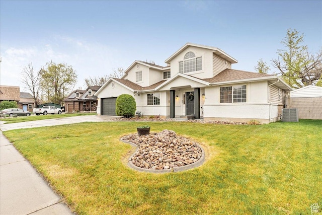 2748 W 220 N, Provo, UT 84601 - traditional home featuring an attached garage, stucco siding, concrete driveway, and a front yard