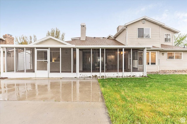 2748 W 220 N, Provo, UT 84601 - rear view of house featuring a lawn, roof with shingles, a chimney, and a sunroom