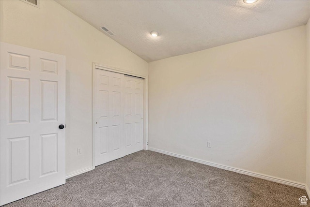 2748 W 220 N, Provo, UT 84601 - unfurnished bedroom featuring carpet floors, baseboards, lofted ceiling, visible vents, and a closet