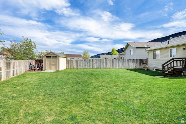 176 N Wapiti Loop E, Hyrum, UT 84319 - view of yard featuring a fenced backyard, an outbuilding, and a shed