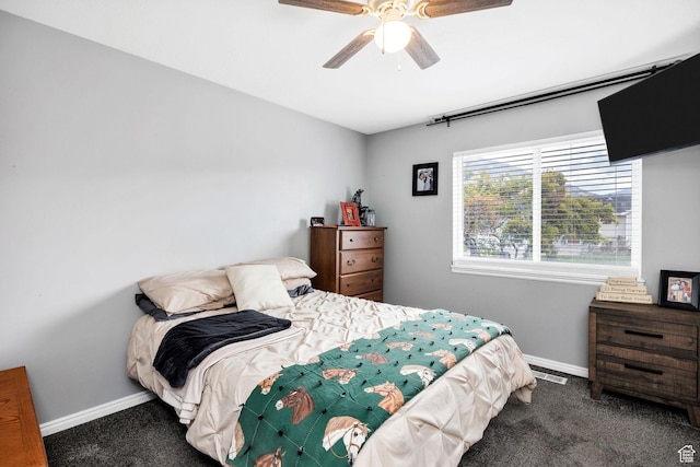 176 N Wapiti Loop E, Hyrum, UT 84319 - carpeted bedroom featuring baseboards, visible vents, and ceiling fan