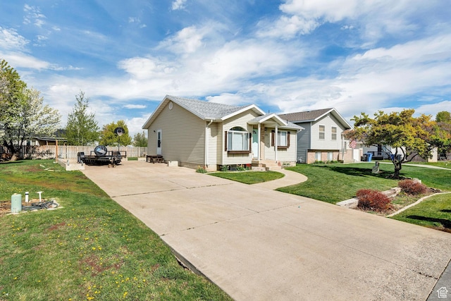 176 N Wapiti Loop E, Hyrum, UT 84319 - ranch-style home featuring a patio, a front lawn, fence, and driveway