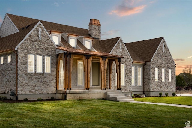473 W 350 S Unit 31, Mapleton, UT 84664 - view of front of property with a chimney, a lawn, stone siding, and a porch