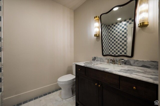 473 W 350 S Unit 31, Mapleton, UT 84664 - bathroom with baseboards, toilet, and vanity