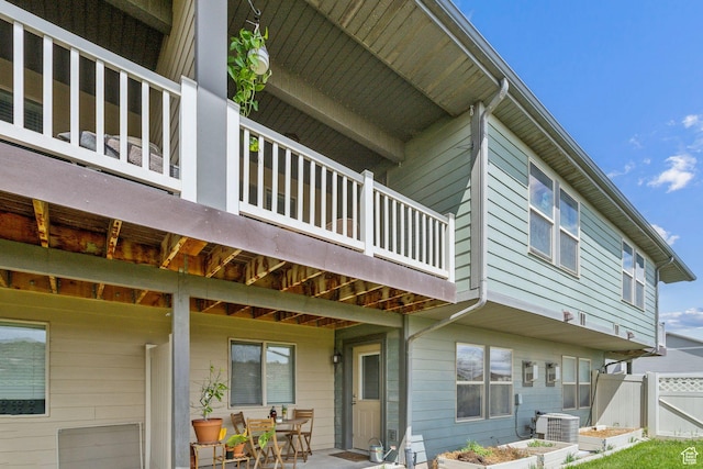 103 E River View Dr, Saratoga Springs, UT 84045 - exterior space featuring central air condition unit, a patio, fence, and a balcony