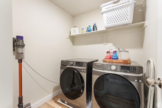 838 N Marble Rd, Tooele, UT 84074 - laundry room featuring independent washer and dryer, laundry area, baseboards, and wood finished floors