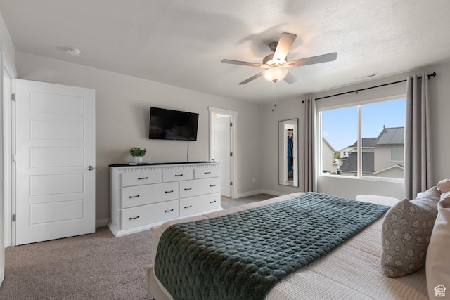 838 N Marble Rd, Tooele, UT 84074 - bedroom featuring visible vents, a ceiling fan, baseboards, and light carpet