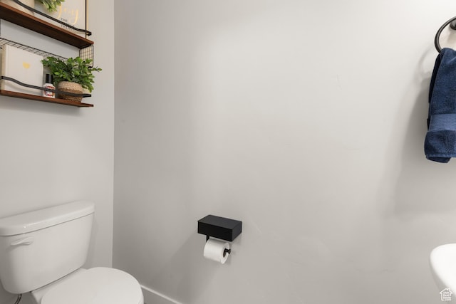 838 N Marble Rd, Tooele, UT 84074 - bathroom with toilet and baseboards