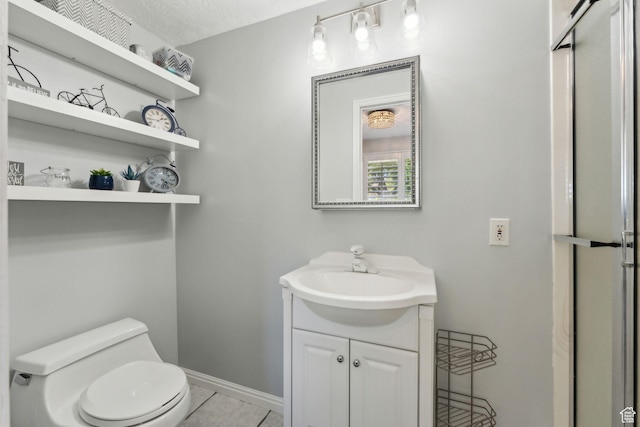 867 E 2850 N, North Ogden, UT 84414 - bathroom with vanity, tile patterned flooring, baseboards, and toilet