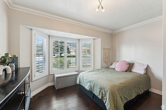 867 E 2850 N, North Ogden, UT 84414 - bedroom with crown molding, a textured ceiling, baseboards, and dark wood-style floors