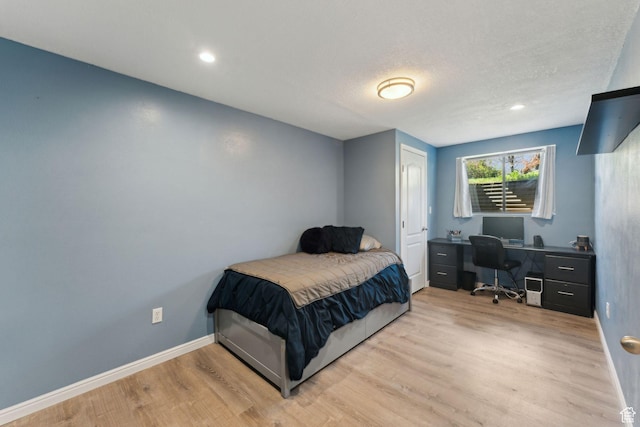 867 E 2850 N, North Ogden, UT 84414 - bedroom with baseboards, recessed lighting, a textured ceiling, and wood finished floors