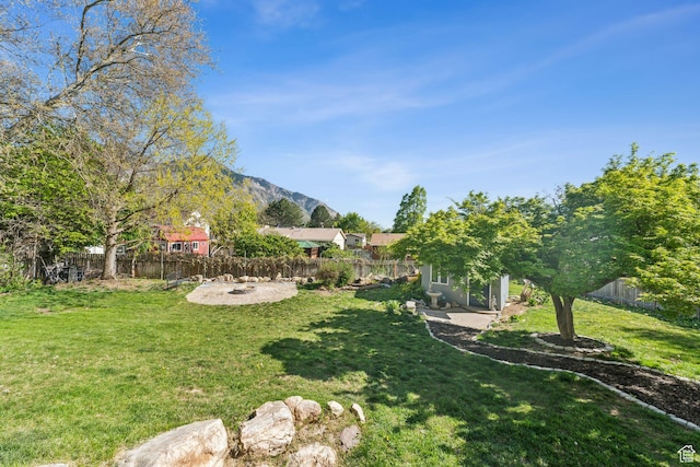 867 E 2850 N, North Ogden, UT 84414 - view of yard featuring a fenced backyard and a mountain view