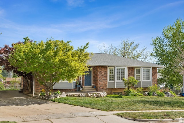 867 E 2850 N, North Ogden, UT 84414 - view of front facade featuring entry steps, concrete driveway, a front lawn, and brick siding