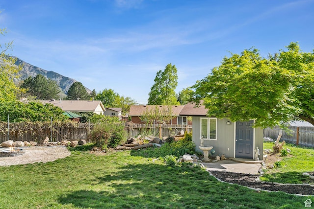 867 E 2850 N, North Ogden, UT 84414 - view of yard featuring a fenced backyard and a mountain view