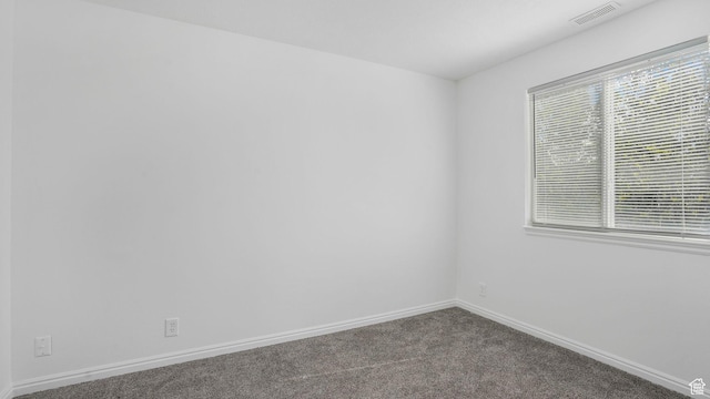10674 S Pine Shadow Rd, South Jordan, UT 84009 - unfurnished room featuring carpet floors, baseboards, and visible vents