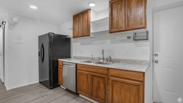 10674 S Pine Shadow Rd, South Jordan, UT 84009 - kitchen with open shelves, a sink, light wood finished floors, dishwasher, and black fridge