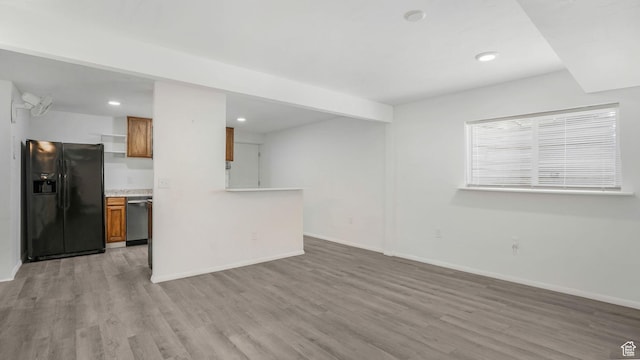 10674 S Pine Shadow Rd, South Jordan, UT 84009 - unfurnished living room featuring light wood-style floors, recessed lighting, and baseboards