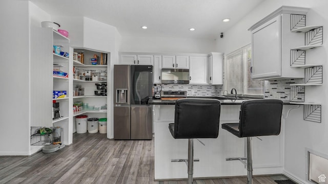 10674 S Pine Shadow Rd, South Jordan, UT 84009 - kitchen featuring dark countertops, open shelves, wood finished floors, stainless steel fridge with ice dispenser, and white cabinets