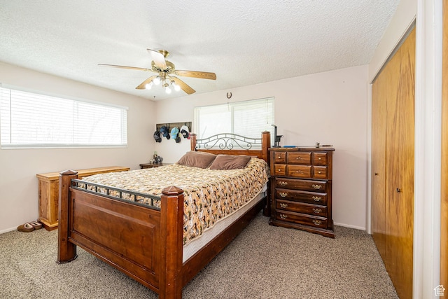 75 S 300 W, Morgan, UT 84050 - carpeted bedroom featuring baseboards, a textured ceiling, ceiling fan, and a closet