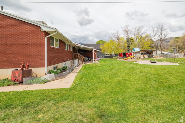 75 S 300 W, Morgan, UT 84050 - view of yard featuring a playground, fence, and a fire pit