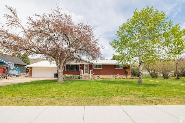 75 S 300 W, Morgan, UT 84050 - ranch-style home with driveway, a front lawn, and brick siding
