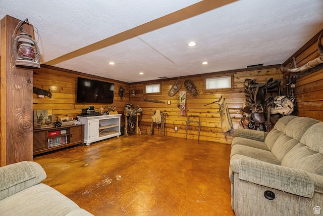 75 S 300 W, Morgan, UT 84050 - living area with recessed lighting, wood walls, concrete floors, and a textured ceiling