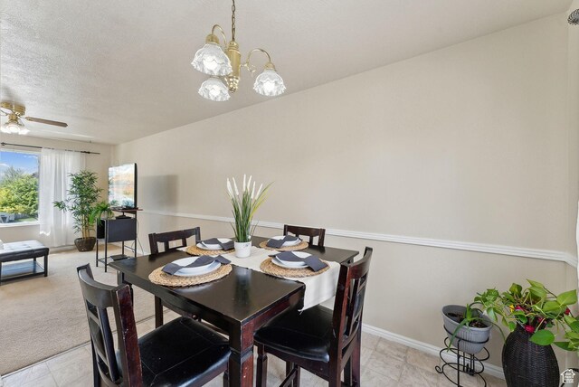 668 N 1370 W, Pleasant Grove, UT 84062 - dining room with baseboards, ceiling fan with notable chandelier, and a textured ceiling