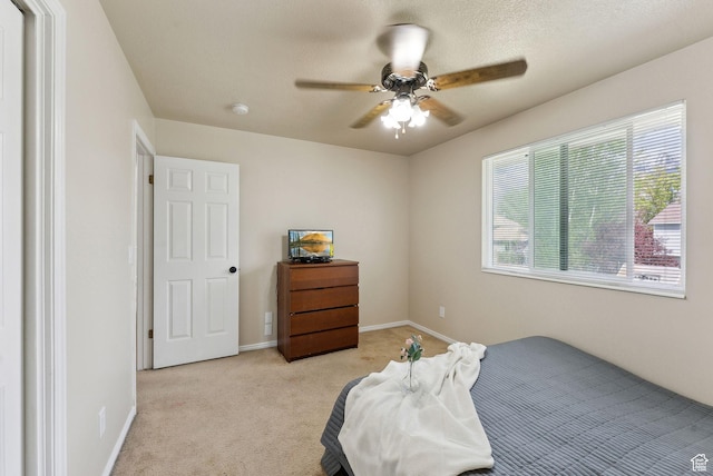 668 N 1370 W, Pleasant Grove, UT 84062 - bedroom with baseboards, ceiling fan, and light colored carpet