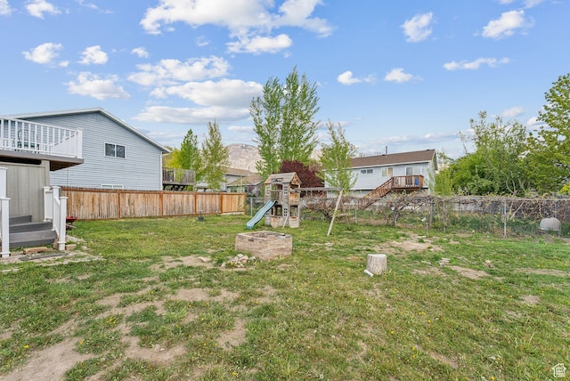 668 N 1370 W, Pleasant Grove, UT 84062 - view of yard featuring a fenced backyard and a playground