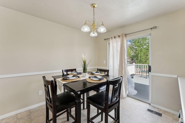 668 N 1370 W, Pleasant Grove, UT 84062 - dining room with a textured ceiling, baseboards, visible vents, and an inviting chandelier