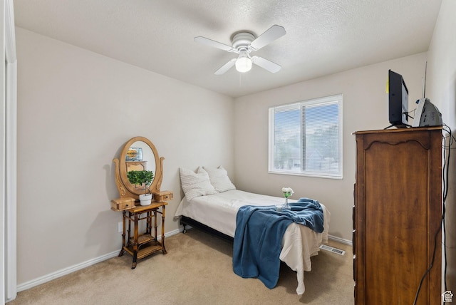 668 N 1370 W, Pleasant Grove, UT 84062 - bedroom featuring visible vents, baseboards, light colored carpet, a textured ceiling, and a ceiling fan