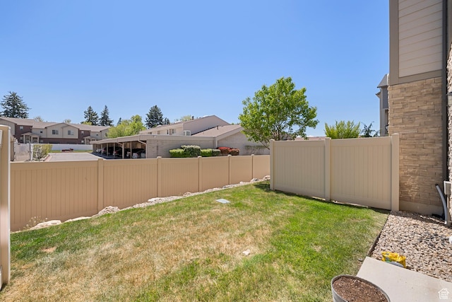 1940 S 200 W Unit 16, Bountiful, UT 84010 - view of yard with fence and a residential view
