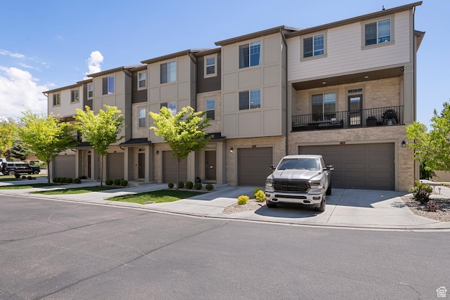1940 S 200 W Unit 16, Bountiful, UT 84010 - multi unit property featuring a garage, driveway, and stone siding