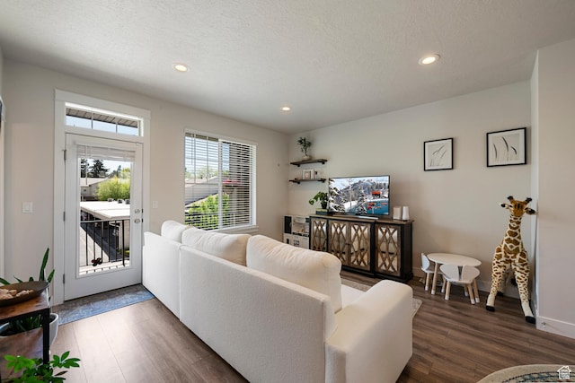 1940 S 200 W Unit 16, Bountiful, UT 84010 - living room featuring baseboards, a textured ceiling, recessed lighting, and wood finished floors