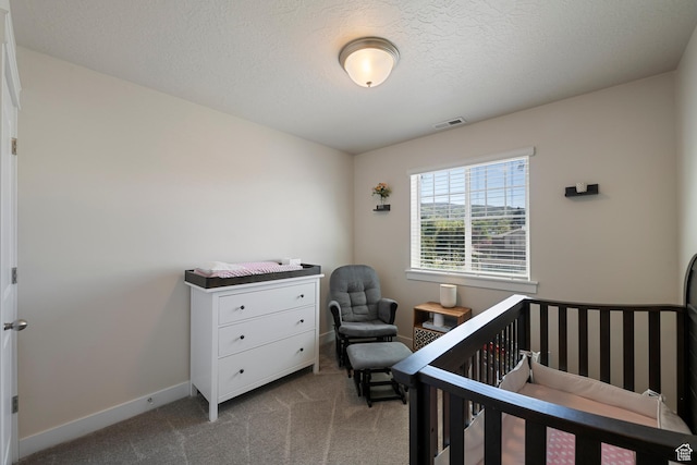 1940 S 200 W Unit 16, Bountiful, UT 84010 - bedroom featuring carpet flooring, a nursery area, baseboards, and visible vents